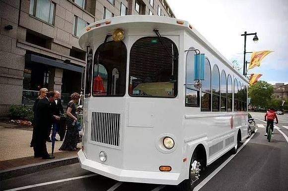 White Trolley Wedding Party Hotel Pickup 23 Passanger Father of the Bride Boarding Rental Philadelphia Parkway Flags Mother of the Bride